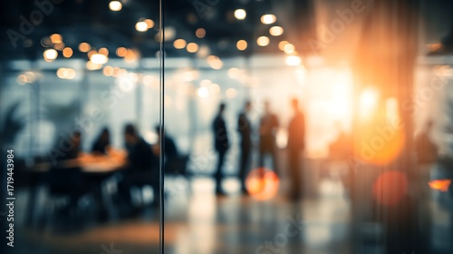 Abstract Blurred Business People Silhouettes in Modern Office with Bokeh Lights
