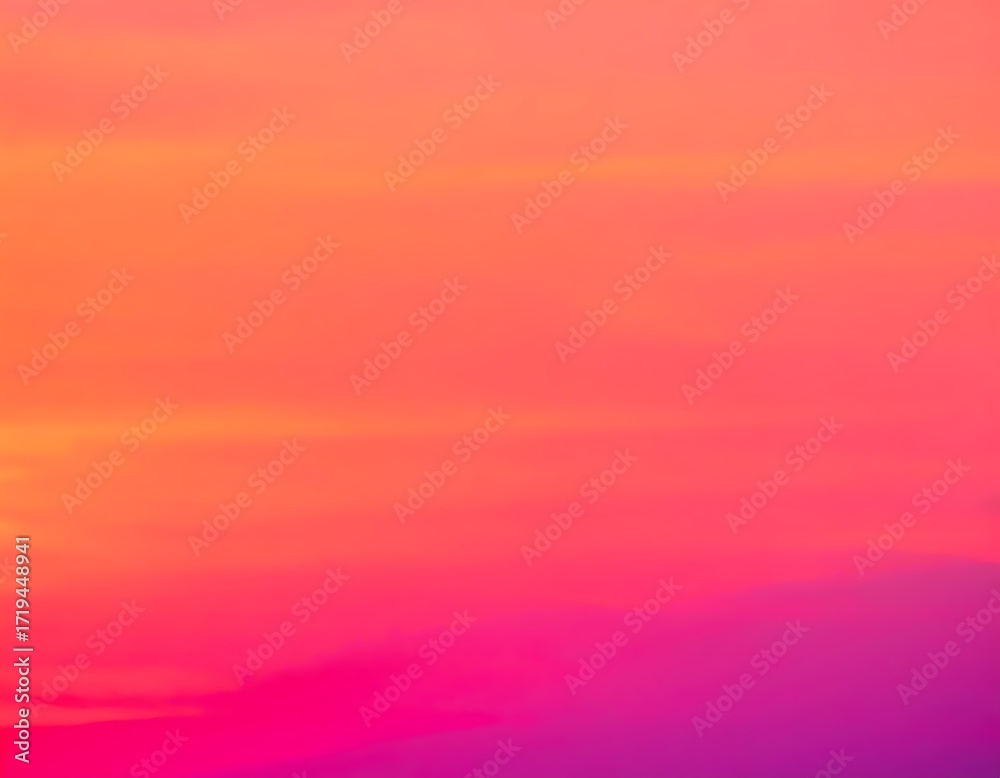 Naklejka premium Vibrant Gradient Sky with Orange, Pink, and Purple Hues at Sunset