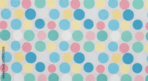 Colorful Polka Dot Pattern on Textured Fabric Background.