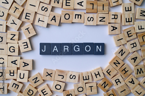 Jargon word in wooden cube blocks, specialized language concept, professional terminology idea, communication and industry theme