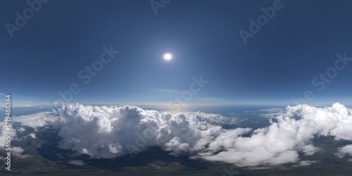 Panoramic hdr view of clouds and sunlight above earth aerial landscape