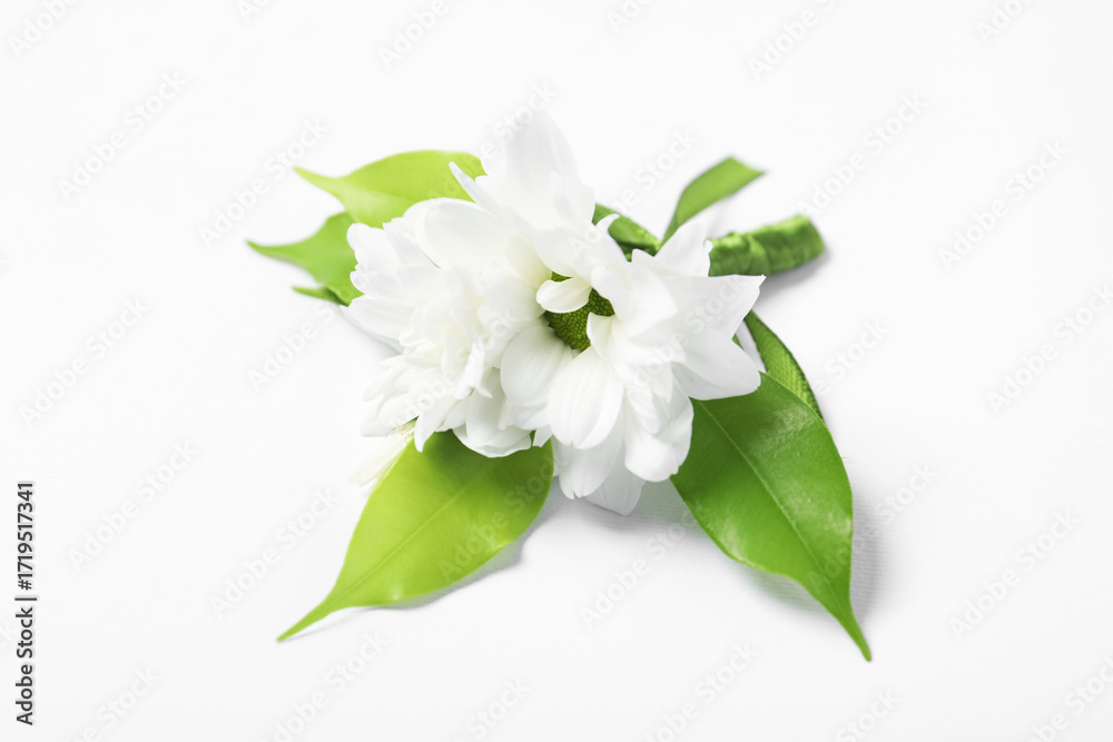 Fototapeta premium Boutonniere with beautiful flowers on white background, closeup