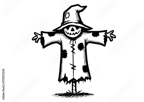 Scarecrow with a smiling face wearing a torn hat in a field  