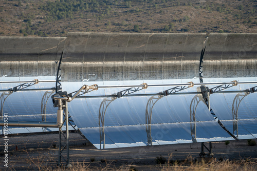 Принти на полотні Solar thermal power station with rows of parabolic trough mirrors reflecting sunlight