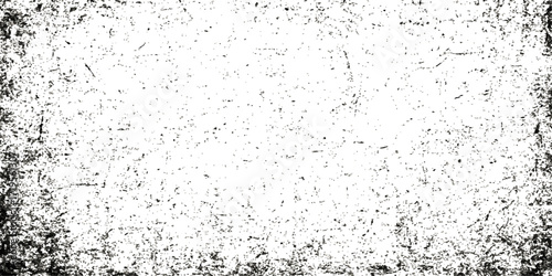 Abstract black and white grunge texture of a dirty, wet concrete wall with a vintage rain drop pattern