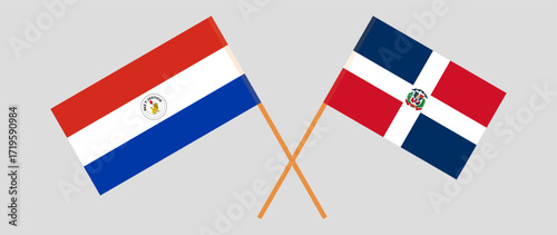 Crossed flags of Republic of Paraguay and Dominican Republic. Official colors. Correct proportion. Vector illustration