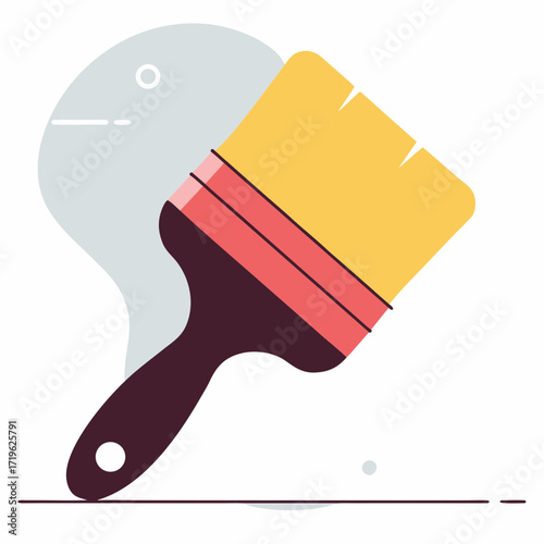 Bright yellow paintbrush resting on a flat surface with a clean backdrop showcasing its simplicity and functional design