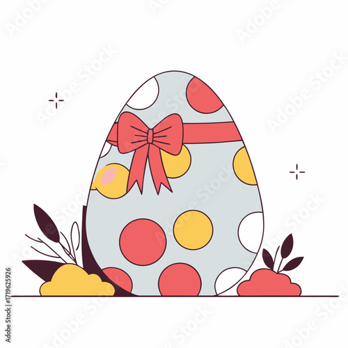 Colorful decorated egg with polka dots and ribbon placed among flowers in springtime setting