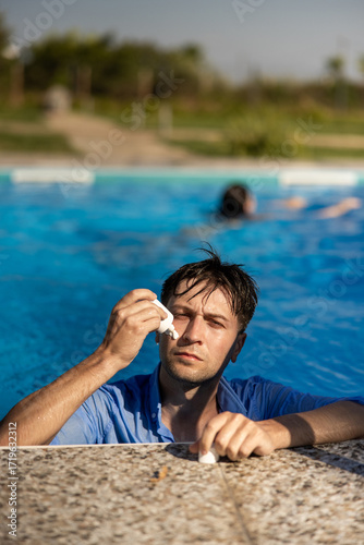 Enjoying a Relaxing and Refreshing Poolside Moment Filled with Reflection and Deep Contemplation