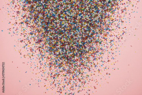 Colorful celebration confetti background.
