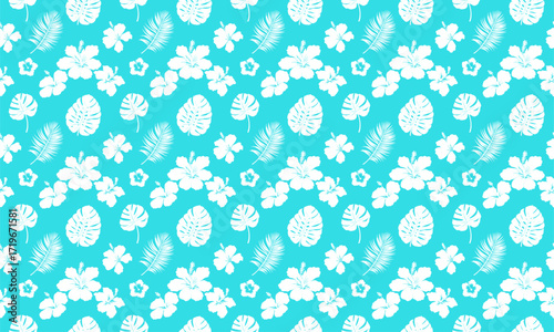 Floral pattern with hibiscus and exotic plants. Hawaiian floral pattern with tropical elements. Seamless tropical print that can be used for wallpaper or wrapping paper.