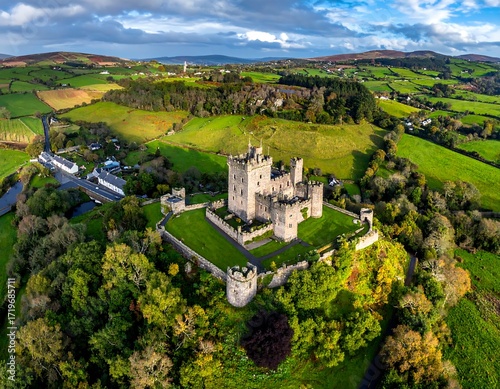Aerial view of a castle nestled in a valley