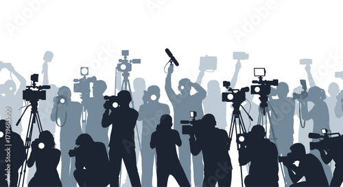 A large crowd of reporters with cameras and microphones is ready to cover an event.