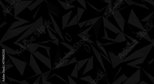 Abstract dark background featuring a geometric pattern of sharp triangles and polygonal shapes design art