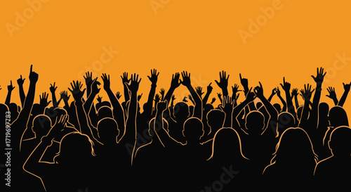 A vibrant crowd of people with their hands raised in celebration and excitement.
