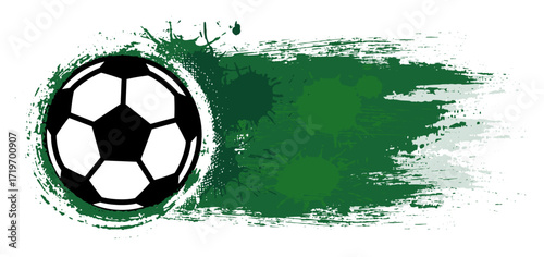 Soccer ball in motion with green splashes of paint