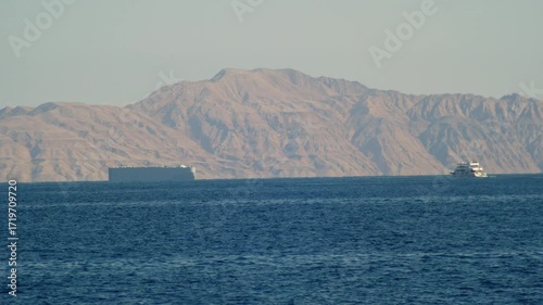 Ships vessels sails in the Red Sea off the coast of Tiran Island