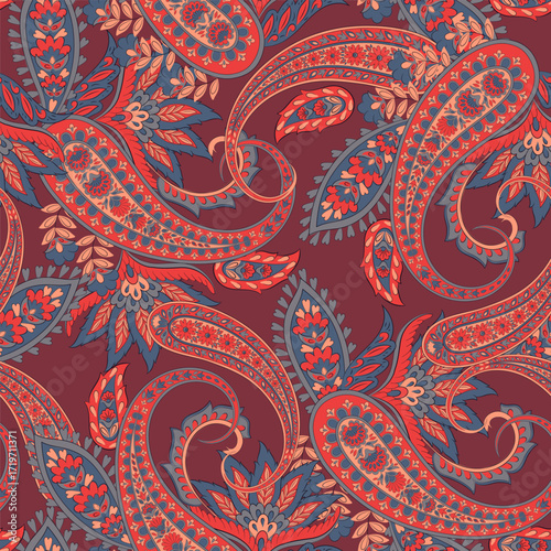 Paisley vector seamless design flowers and leaves in a batik-inspired style. Vintage fabric backdrop