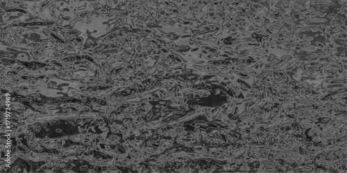 Dark grayscale abstract texture with a complex, organic, and slightly distressed appearance, suitable for moody backgrounds or industrial design elements
