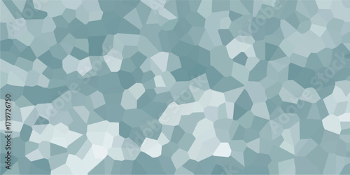 Mosaic-like abstract background composed of irregular polygonal shapes in varying shades of blue and white, creating a crystalline or stained-glass effect