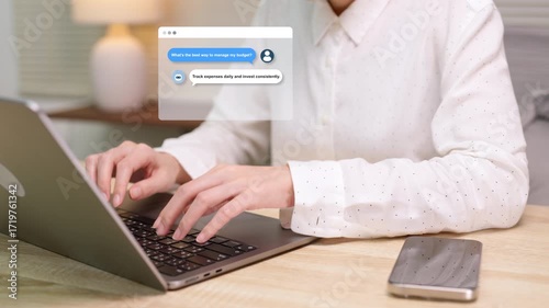 A person works on a laptop displaying a chatbot conversation about financial advice, budgeting tips, and investment guidance for money management.