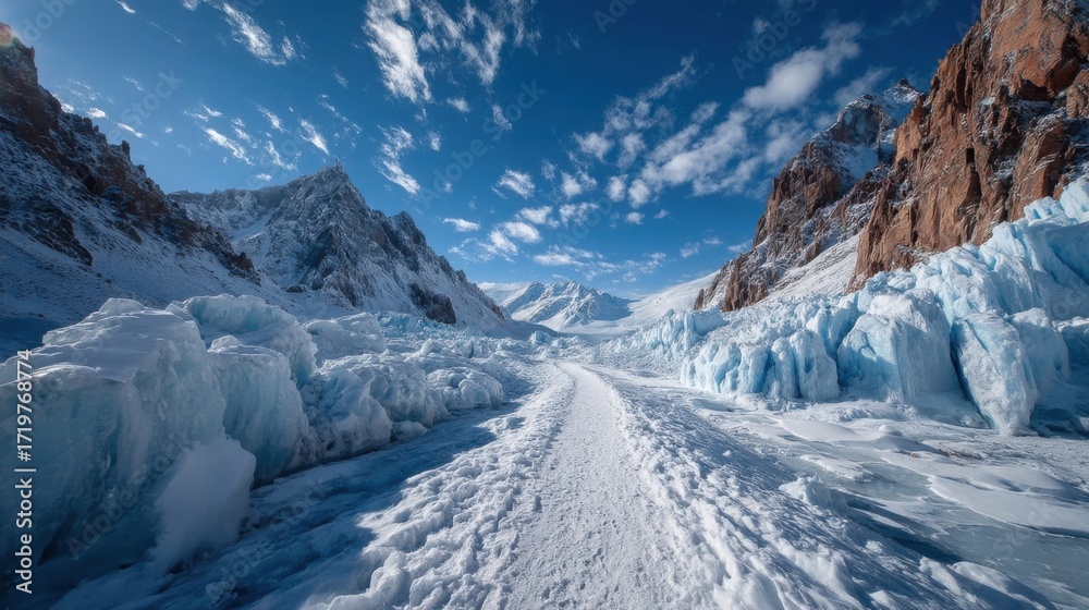 Obraz premium A breathtaking winter scene with a snow-covered path surrounded by towering ice formations,