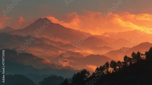 Wallpaper Mural Expansive mountainous landscape bathed in warm sunrise or sunset hues, orange and red sky, golden glow, Torontodigital.ca