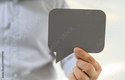 Image of a hand holding a b...