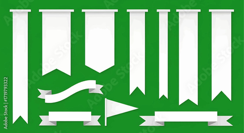 A collection of white banners, ribbons, and flags in various shapes and sizes on a vibrant green background, ideal for graphic design.