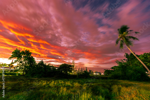 The background of the twilight sunset, the sky has beautiful changes, amidst the green fields and various trees, there is a cool breeze blowing throughout the journey to the viewpoint.