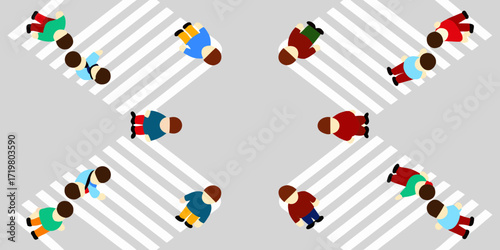 Diverse group of people crossing a street at a pedestrian crossing from an aerial view