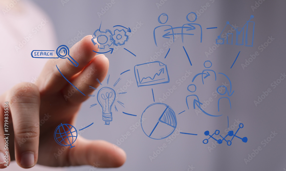 Fototapeta premium Hand pointing at digital business plan. Teamwork, innovation, strategy, growth.