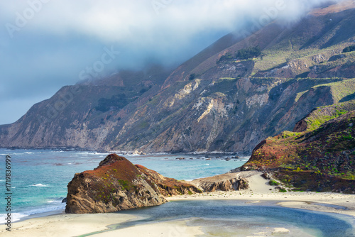 Photos Scenic Highway 1 in Big Sur, California USA, with winding road, green coastal mo