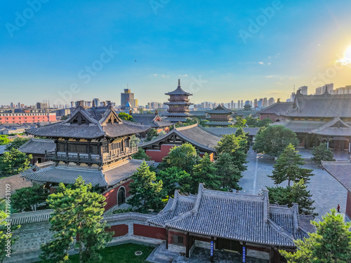 Aerial photography of Huayan Temple in Datong, Shanxi, China on a sunny summer day with fiery clouds