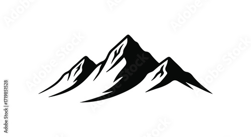 Majestic mountain peaks in stark black and white silhouette against a bright sky.