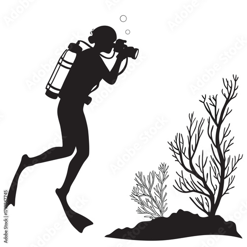 Diver photographing reef silhouette