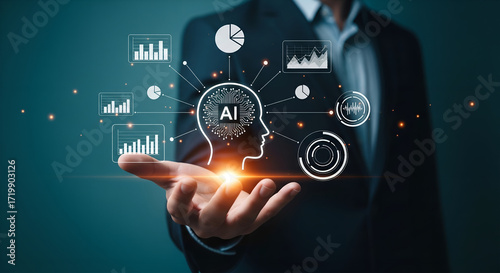 Businessman holding artificial intelligence and data analysis graphics in his hand