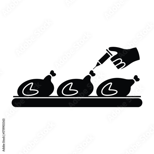 Industrial food processing line injecting seasoning into raw chickens on a conveyor belt