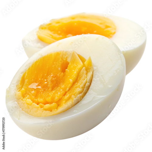 Close-up of two halves of a hard-boiled egg, showcasing the white and vibrant yellow yolk, isolated on a white background