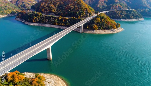 Highway bridge over turquoise lake