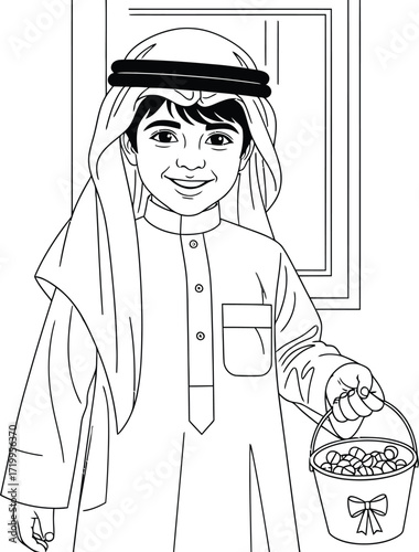 Smiling boy in traditional arab dress holding candy bucket