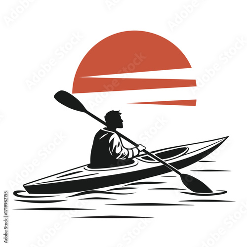 Kayaker watching sunset silhouette