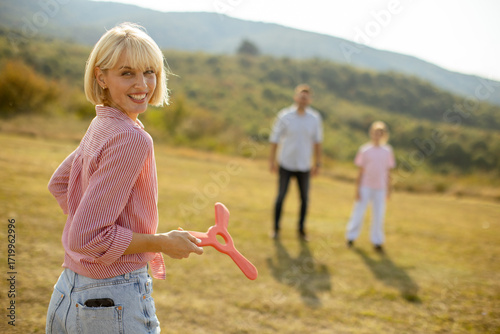 Playing catch in a sunny fi...