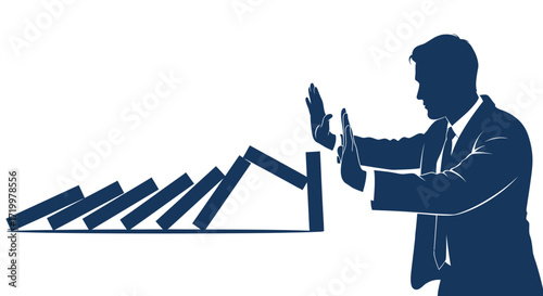 Business man stopping domino effect representing prevention and risk management strategy
