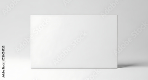 Clean White Square Box Mockup Standing Against Neutral Grey Background