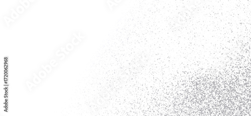 Gradient image showcasing a transition from pure white to a dense collection of silver specks, creating a textured effect across the lower right portion of the frame