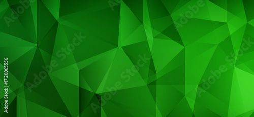 This striking image presents a low poly design in varying shades of green, featuring geometric shapes and triangles that create a modern and dynamic polygonal effect