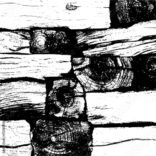 Monochrome close up of stacked wooden logs and planks with visible wood grain and textures in black and white