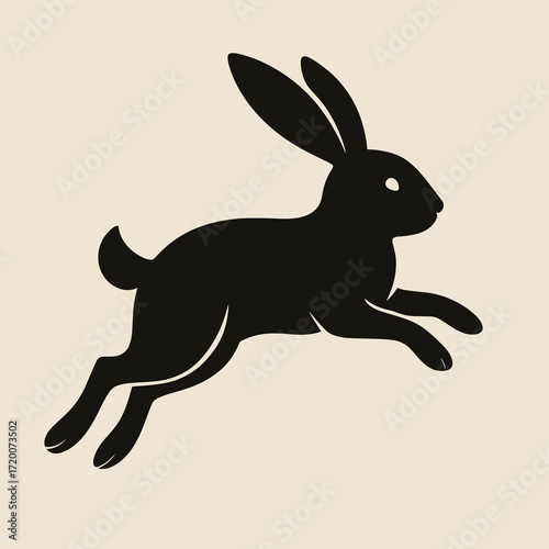 Silhouette of a leaping rabbit in a playful mood, minimalist design, copy space