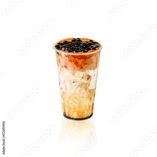 Cold bubble milk tea with brown sugar and tapioca pearls, isolated on white background